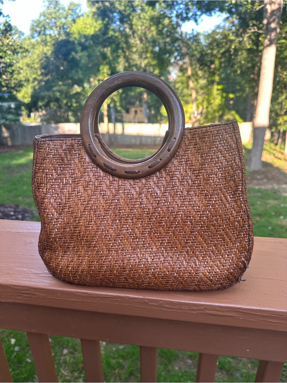 Fossil woven bag with wooden handles